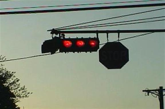 Triple red light signal head