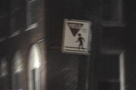 Yield to pedestrians (graphic and text)