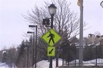 Pedestrian signal flashing at drivers