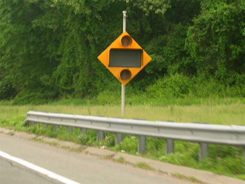 Overheight vehicle warning sign system
