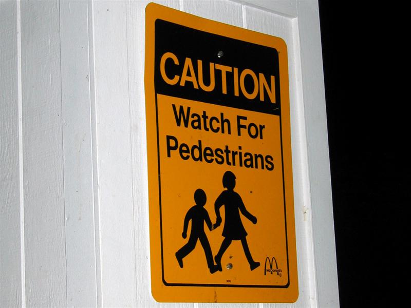 Caution; Watch for pedestrians; McDonalds