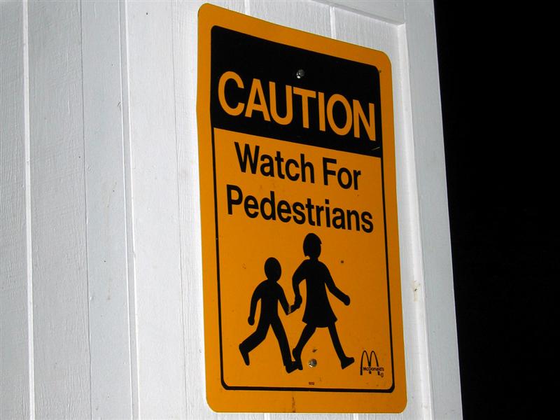 Caution; Watch for pedestrians; McDonalds