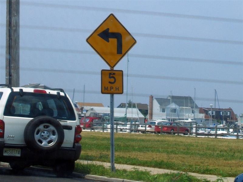 Left turn; 5 m.p.h. advisory speed