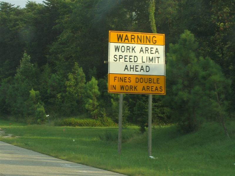 Warning; Work area speed limit ahead; Fines double in work area