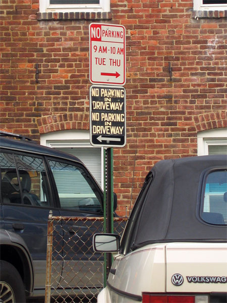 No parking in driveway, No parking in driveway (black sign, white lettering)