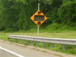 Overheight vehicle warning sign system