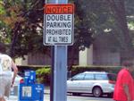Notice: Double parking prohibited at all times