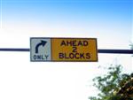 Right turn only; Ahead 2 blocks