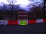Road Closed (fluorescent yellow-green, with orange spray paint for detour)